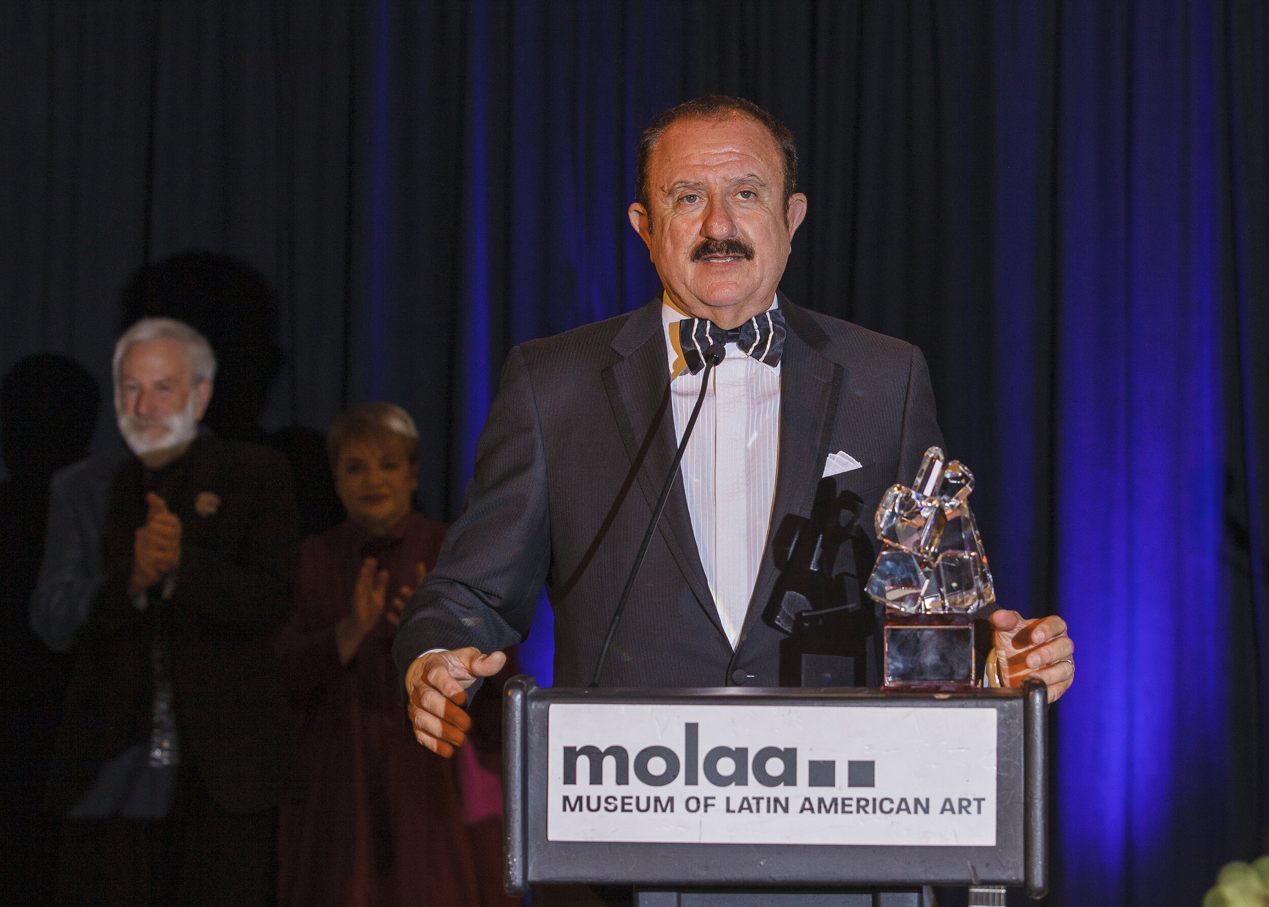  Business executive, Sol Trujillo , gives a speech upon receiving the LEGADO Philanthropy Award at MOLAA’s Annual Gala, 2019. Photo by Justin Galligher. 