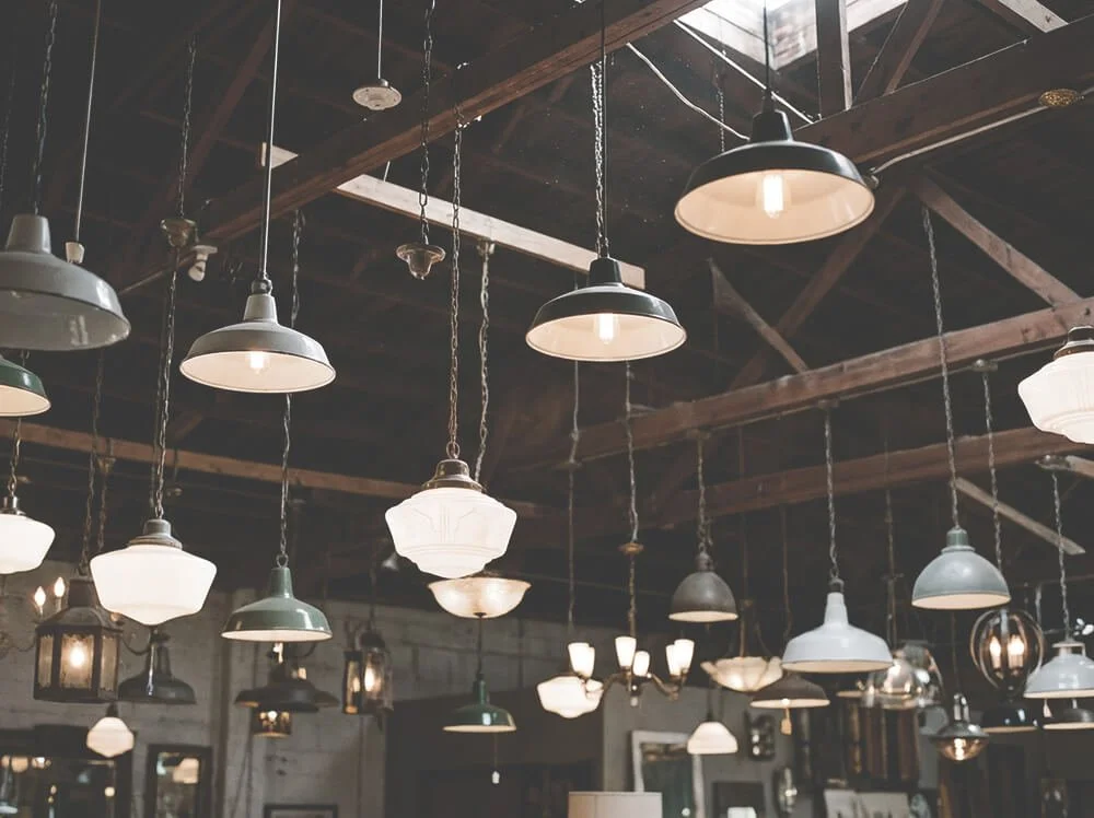 A curated selection of vintage industrial lighting and antique lamps available at Space Lab Vancouver.