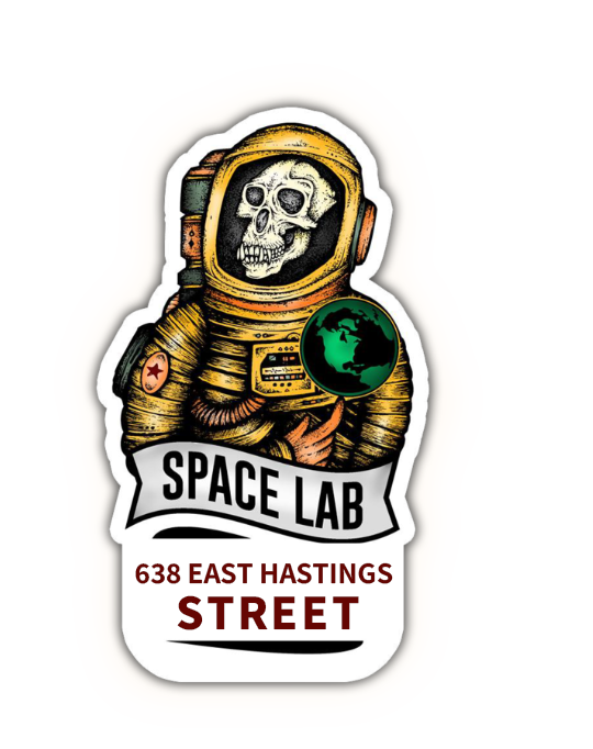 Space Lab logo featuring a vintage astronaut skull and the new address at 638 East Hastings Street, Vancouver's destination for unique industrial antiques and mid-century modern furniture.