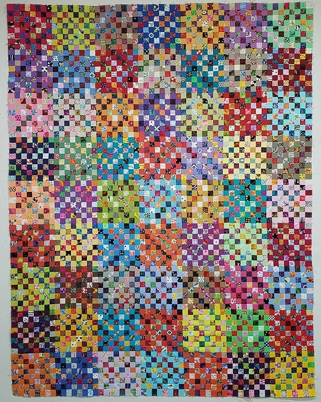 Postage stamp quilt top is done. 4032 squares that finish at one inch.  55.5&quot; x 71.5&quot;. Inspired by @lrdykstra
#postagestampquilt
#colorblockpostagestampquilt