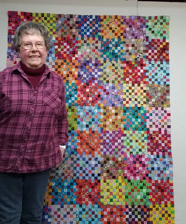 Trying to figure out how to use a long reach selfie stick. I took a  couple dozen goofy photos.