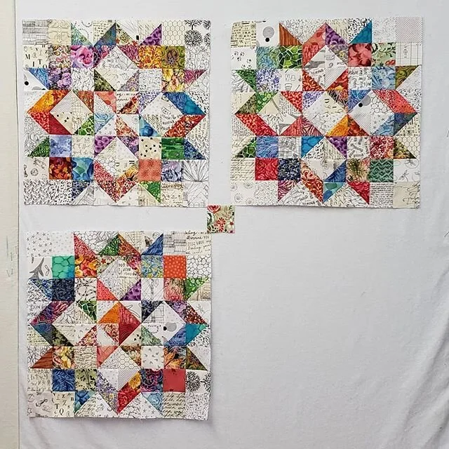 3 blocks sewn with 3 different centers. I'm thinking the blocks need sashing between them now.  This block is a variation of a traditional quilt block named Carpenter's Wheel.