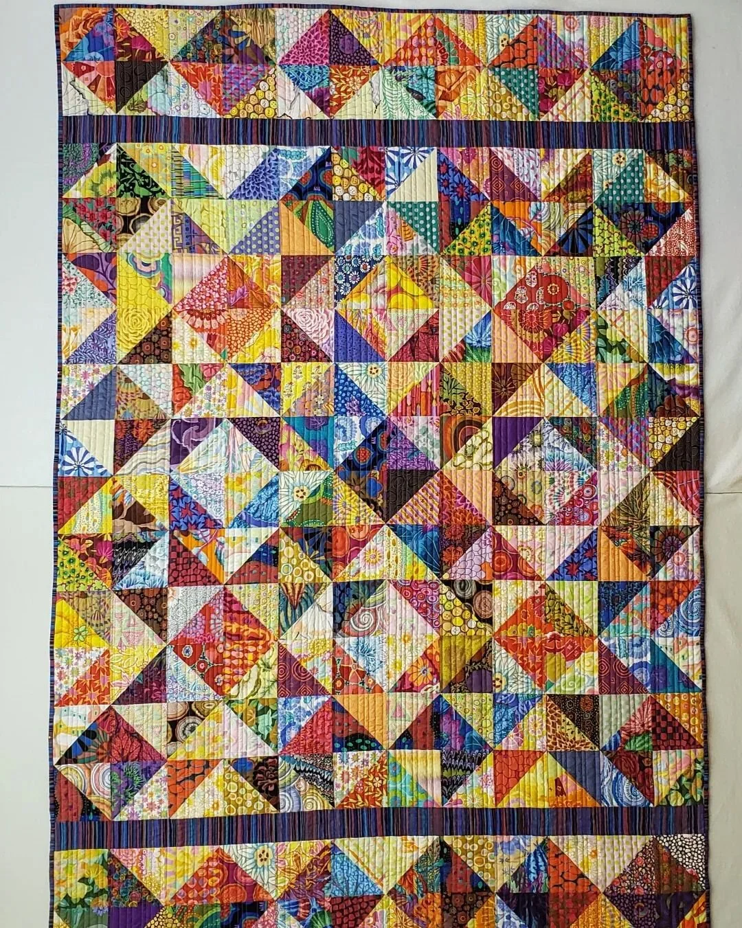 Just finished this quilt made with lots of Kaffe Fassett out of print fabrics plus some newer ones. It is 58&quot; x 84 &quot;. The banana tree backing fabric is one of Kaffe's newer fabrics.  A few closer photos so you can see the beautiful fabrics.