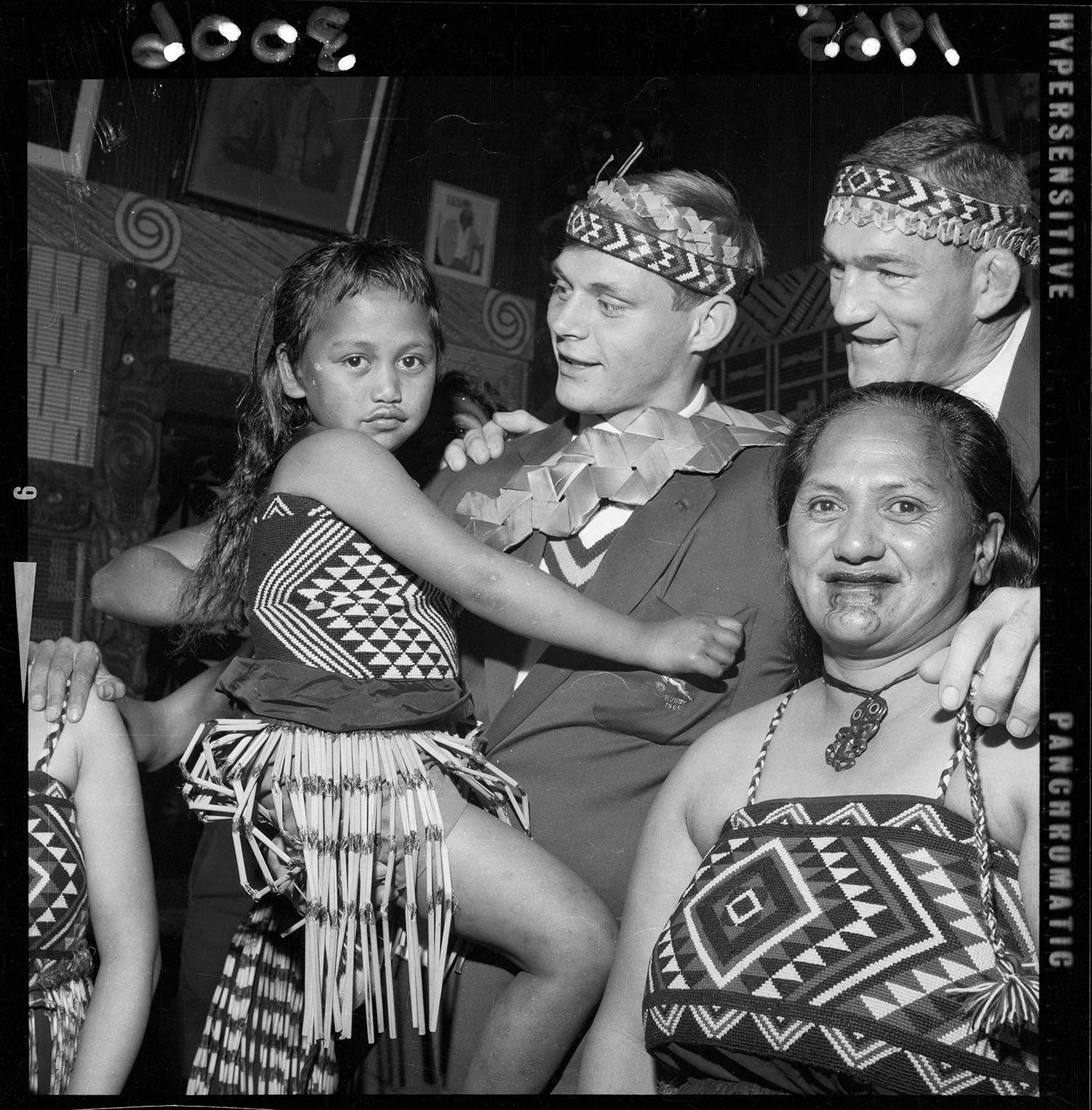 Springbok rugby players during a Maori welcome in Gisborne. Alexander Turnbull Library.