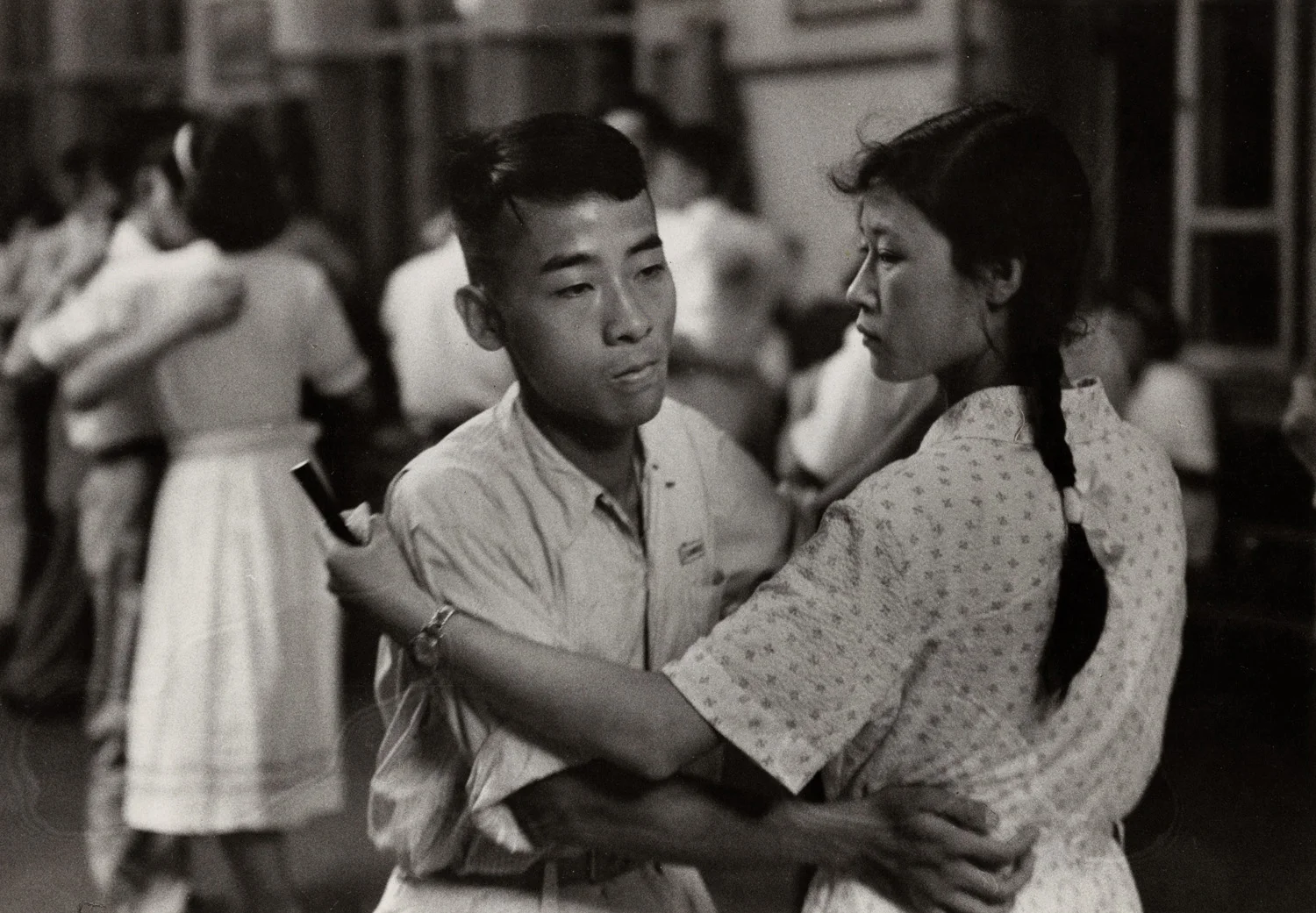 Saturday night dance in a workers’ club at Changchun, north east China. There was a growing interest in European dance and music, but the relationship between the sexes was still rather formal. (RDH C131-8)