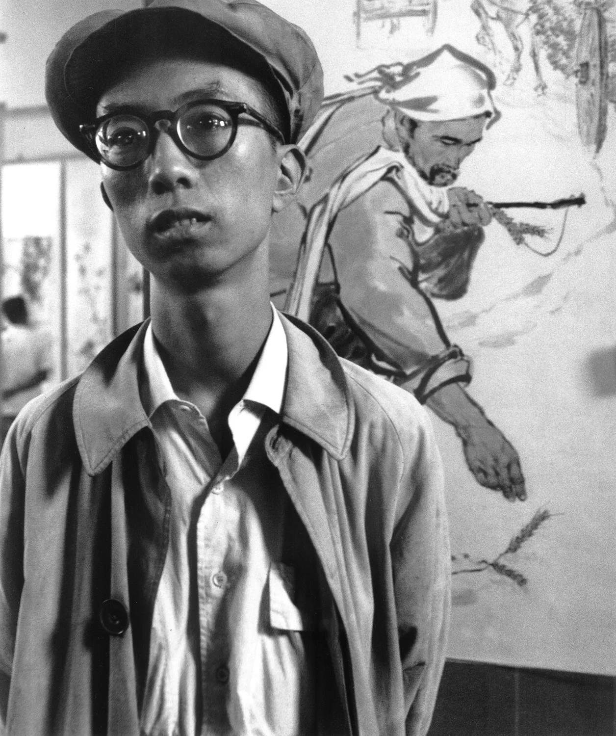 A clerk viewing an art exhibition at Shanghai. China, September 1956. (RDH R68-03)