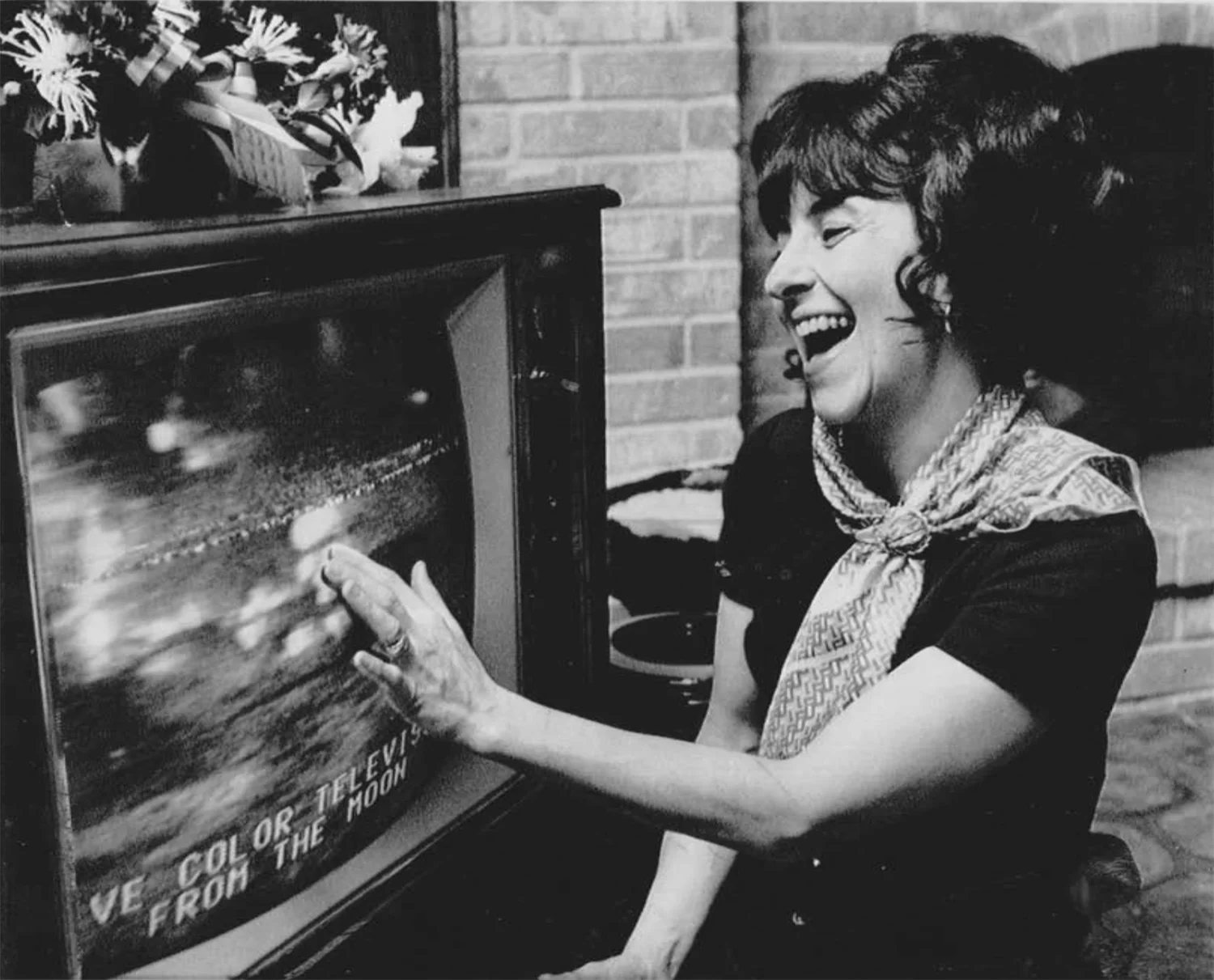 Associated Wire Press Photo (USA), Mrs Edgar Mitchell reaches out to ‘touch’ her husband on the moon. 5 February 1971. Collection of Justine Varga, Sydney.