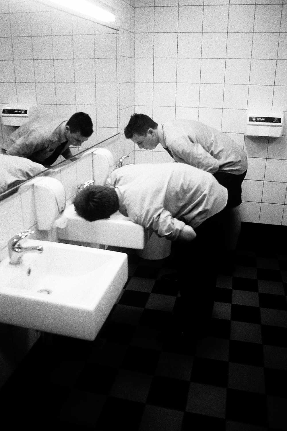 Students drinking from the tap in the CPAC bathroom, 2016