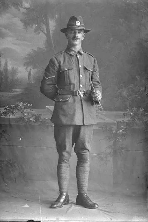 Full length portrait of Lance Corporal Frederick William Campbell, Reg No 49766, of the Auckland Infantry Regiment, A Company, 27th Reinforcements. Sir George Grey Special Collections, Auckland Libraries, 31-C3598