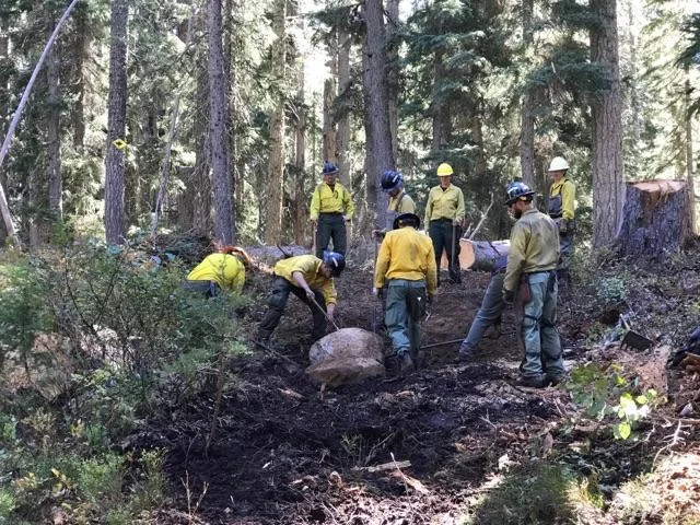 The Black Hills Crew and Resource Advisors work together to rebuild damage riparian areas on the North Pelican Fire
