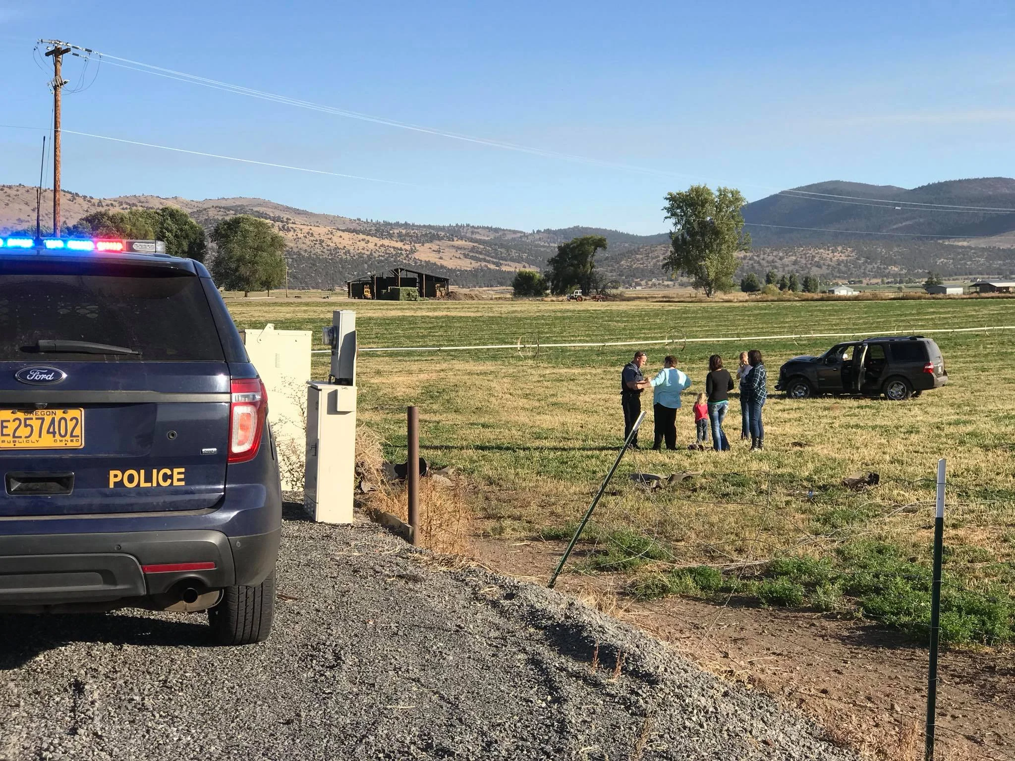 Vehicle 2 of collision came to rest in a field after leaving the Highway 140 roadway. (Brian Gailey)