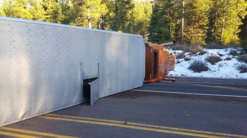 Overturned cattle truck near West Side Road and Highway 140 at Rocky Point. Image by Kathy Johnson-Haas.
