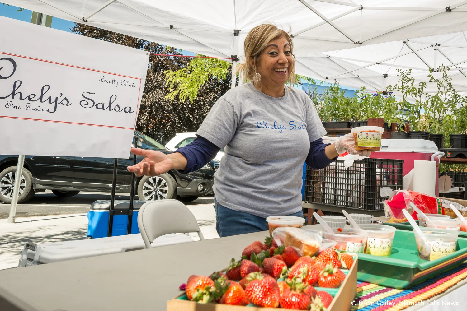 Chely Pinkston, Owner of Chely's Salsa takes a moment from the busy morning for a photograph. June 30, 2018 (Brian Gailey)