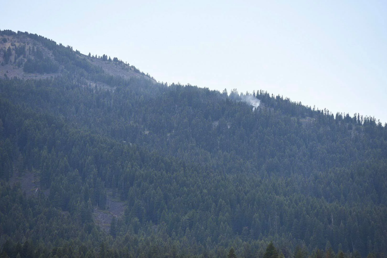 Smoke rises from a lightning sparked fire on Brown Mountain atop the Southern Oregon Cascades near Lake of the Woods and the Jackson/Klamath county line. July 15, 2018 (Brian Gailey)