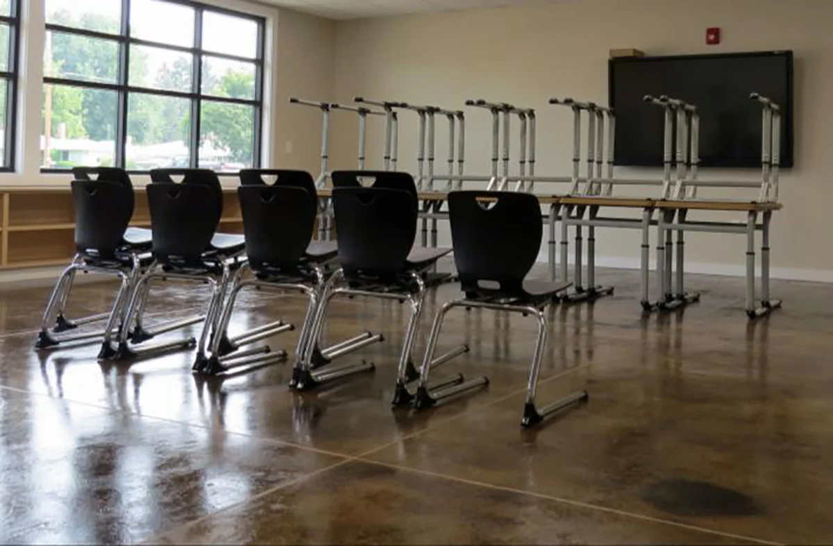 Classroom with new desks, chairs and SMART technology.