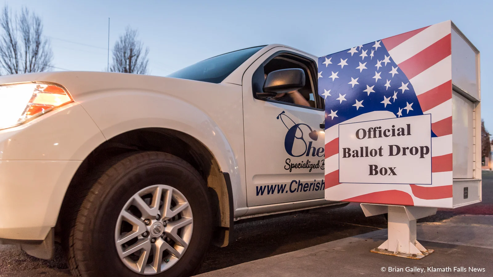 Vehicles line up to drop off ballots behind the Klamath County Government Center. KFN was Live at the ballot box drop point where a steady stream of cars drove through voicing their opinion. Watch at http://bit.ly/2zzNnnc November 6, 2018 (Brian Gailey)