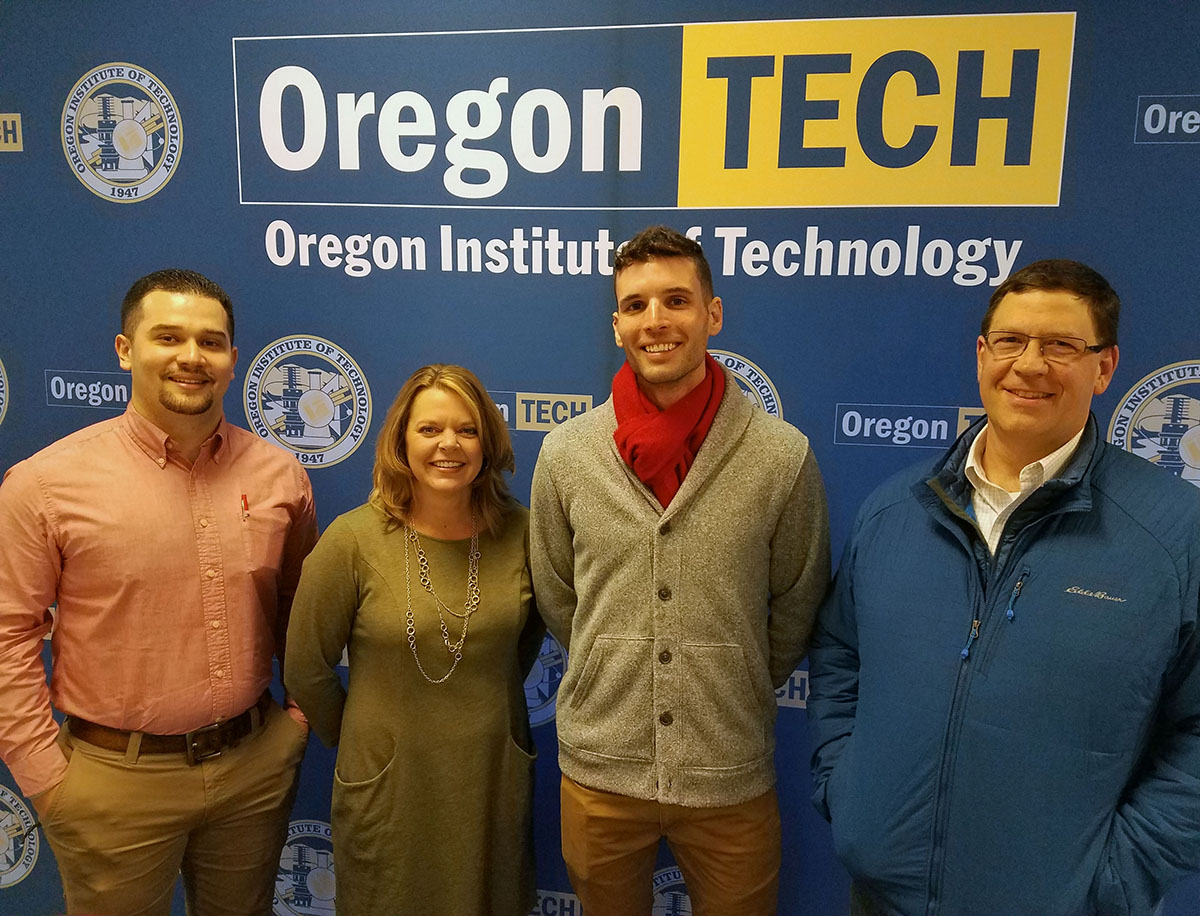 Sergio Cisneros and Benji Henslee of Mazama High School, Luke Ovgard of Henley HIgh School, and Nat Ellis of Klamath Union High School pose for a photo Wednesday after the MOU signing ceremony at Oregon Tech