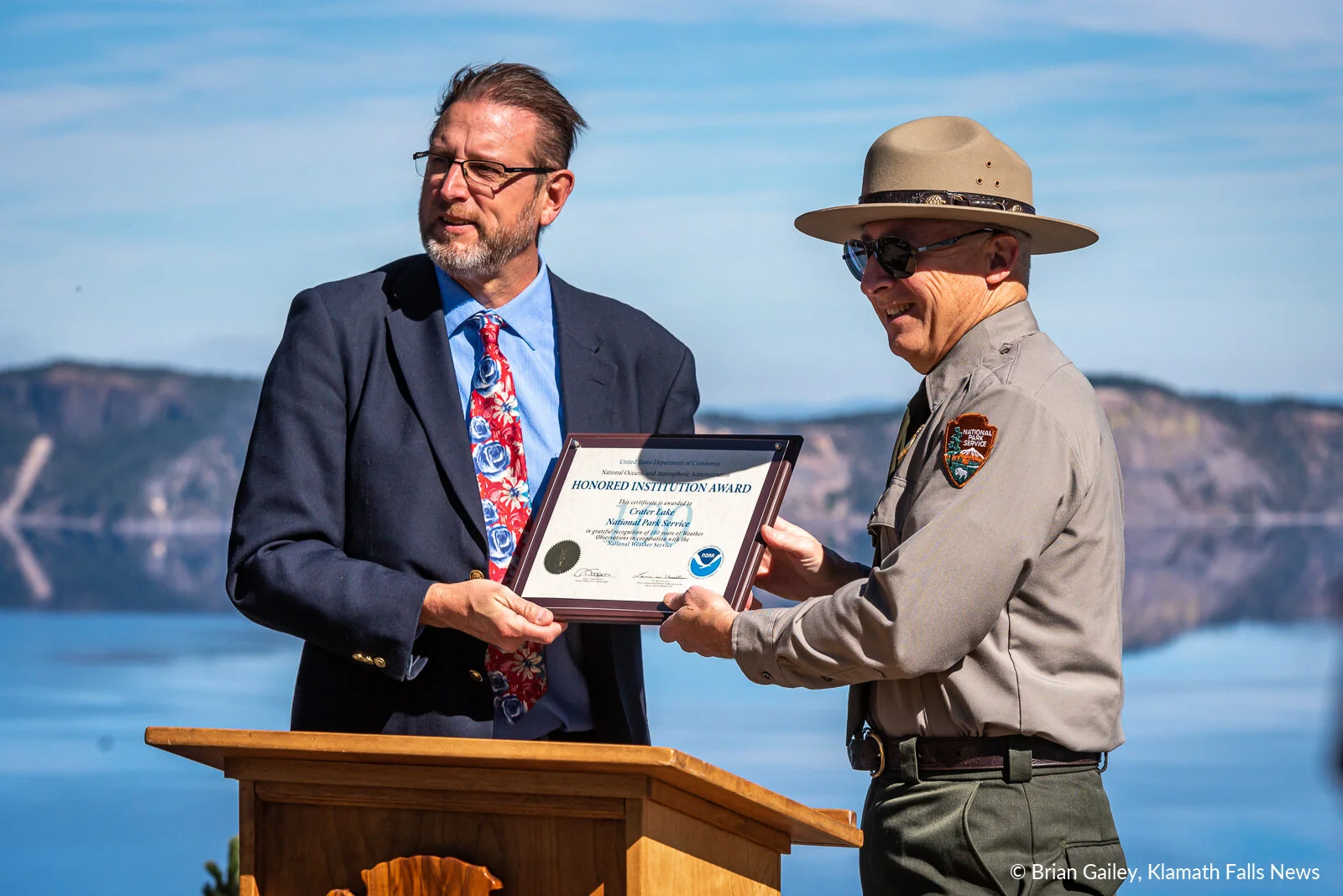 Crater Lake National Park Superintendent Craig Ackerman receives an Honored Institution Award from the National Weather Service on behalf of Crater Lake NP for 100-years of weather observations within the park. October 7, 2019 (Image: Brian Gailey / Klamath Falls News)