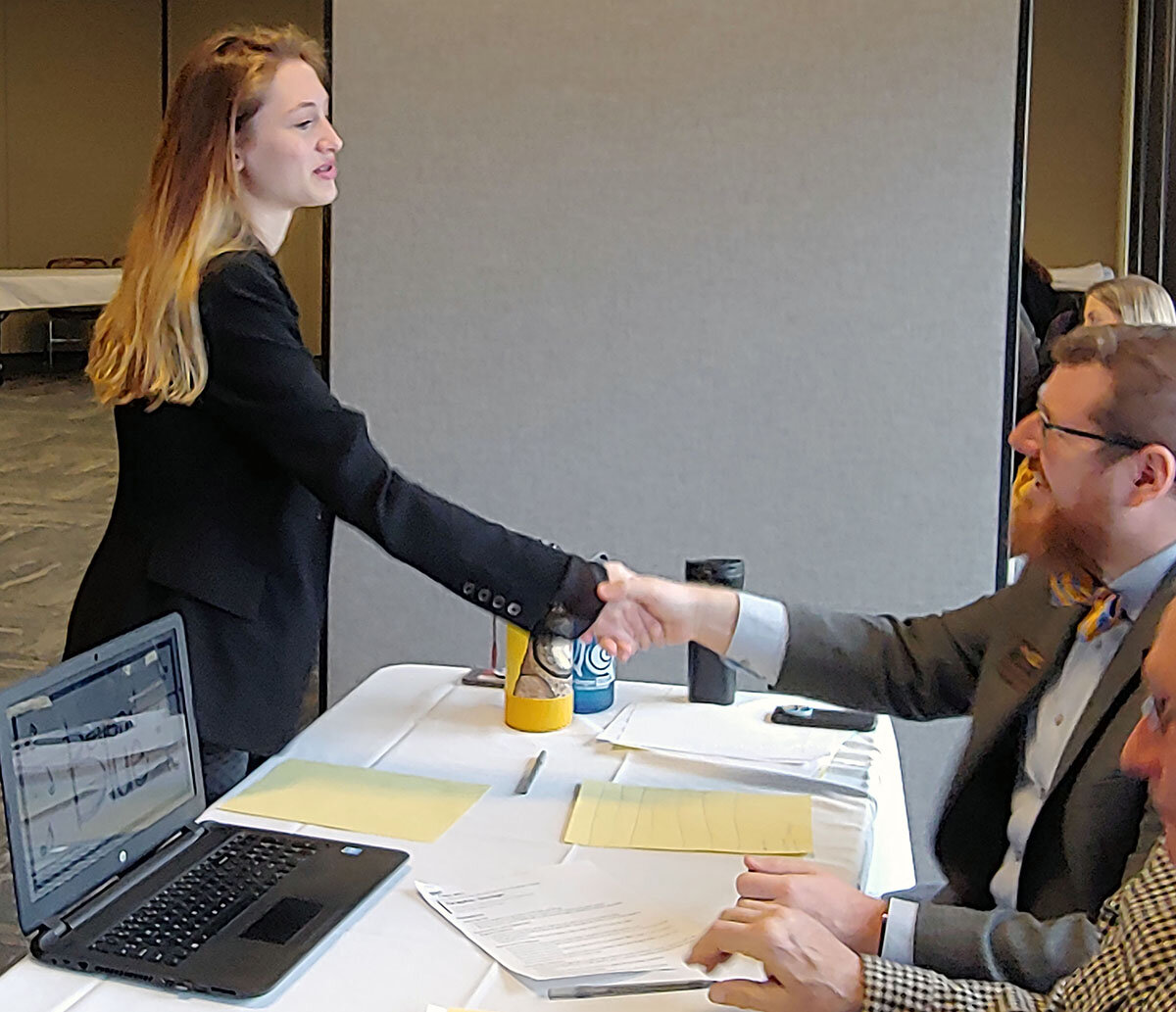  Charlize Byrne, a sophomore at Bonanza, shakes hands with the judges following a presentation at the 2020 FBLA Cascade Regional Skills Conference Wednesday at Oregon Tech 