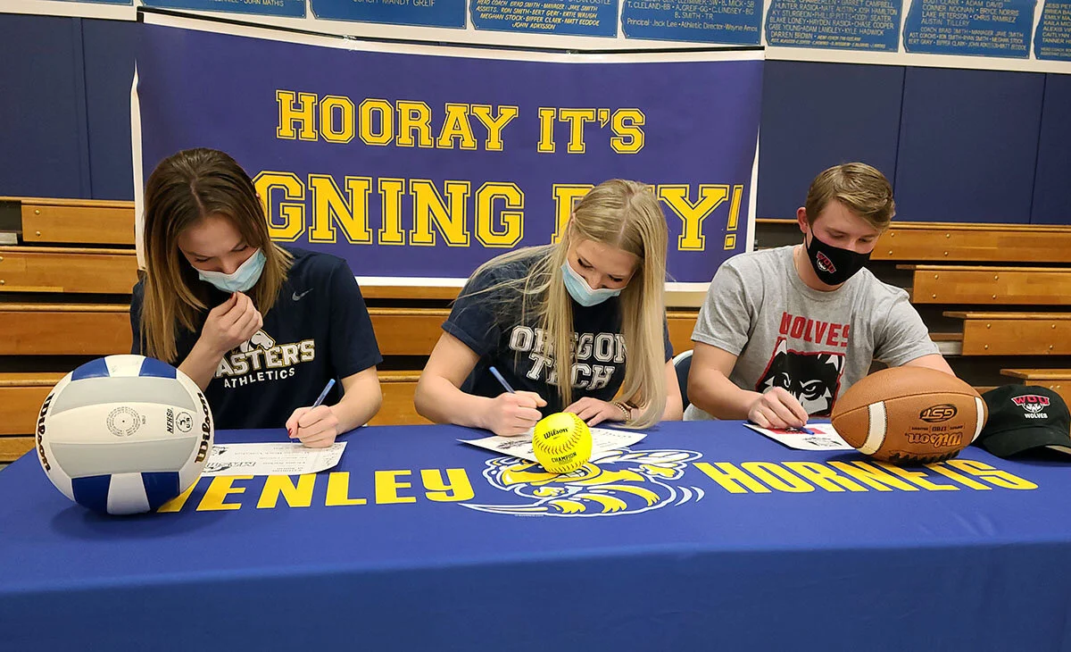 Four Henley athletes sign to play college ball