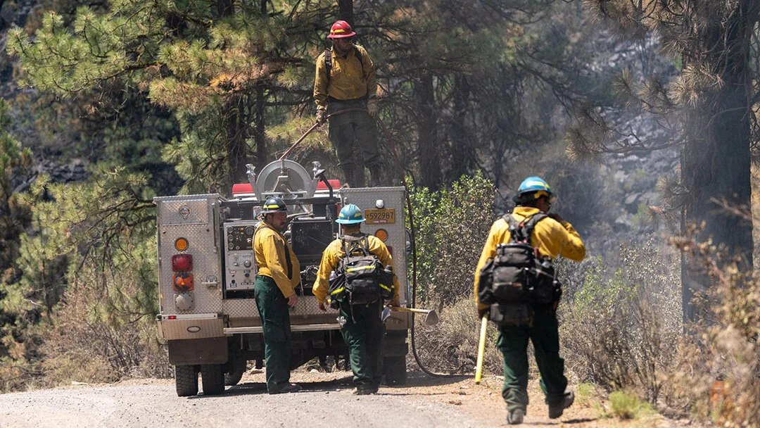 Fire crews mopping up hot spots ahead of coming heat wave