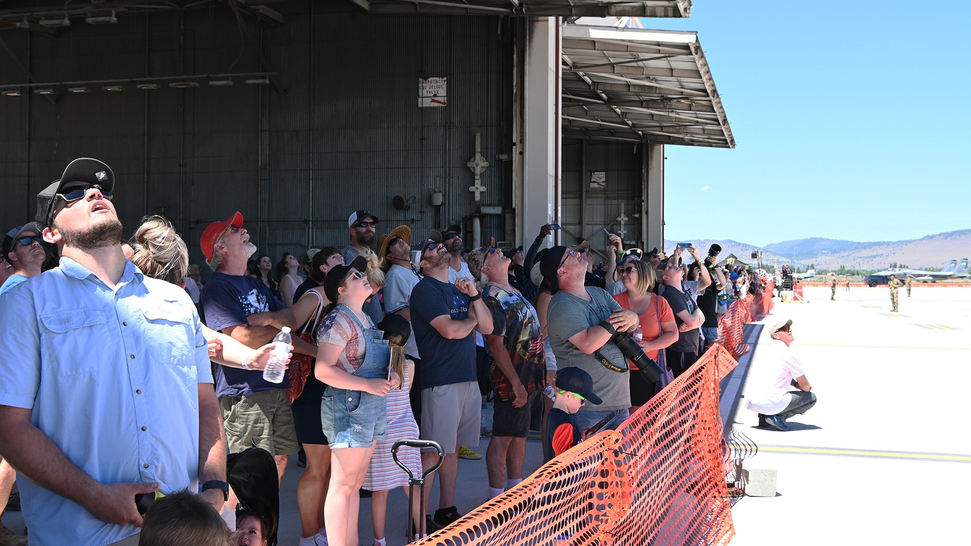  Visiting community members watch aerial demonstrations during the Sentry Eagle Open House June 25, 2022 at Kingsley Field in Klamath Falls, Ore. The open house provided an opportunity for the 173rd Fighter Wing to open the base to the community and 