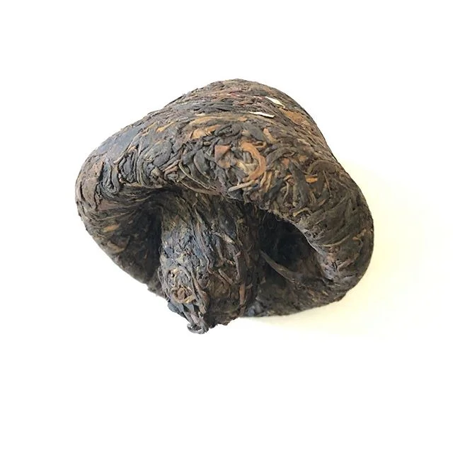 No hallucinations from this mushroom. 2007 DingXing raw puer tea pressed rather tightly into a mushroom shape - will need extra aging time given tight compression compared to average circular &lsquo;bing&rsquo; counterparts. Coming along nicely in th