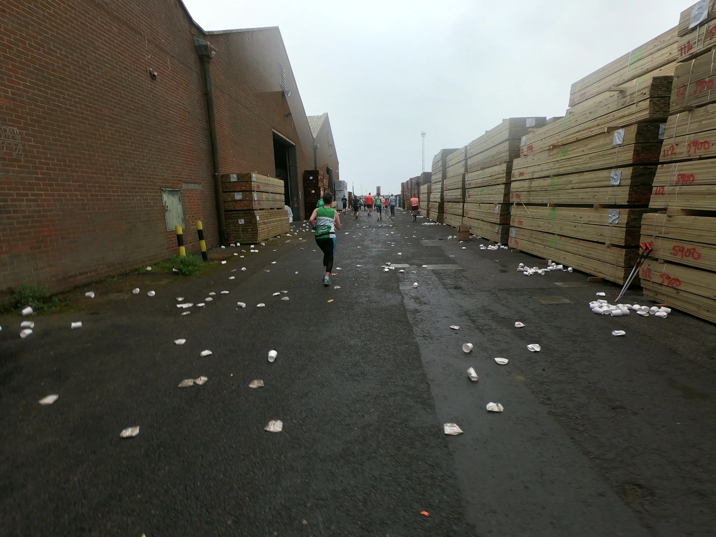 The less glamorous business end of the Brighton Marathon running between storage units at 20 miles in the wind and the rain