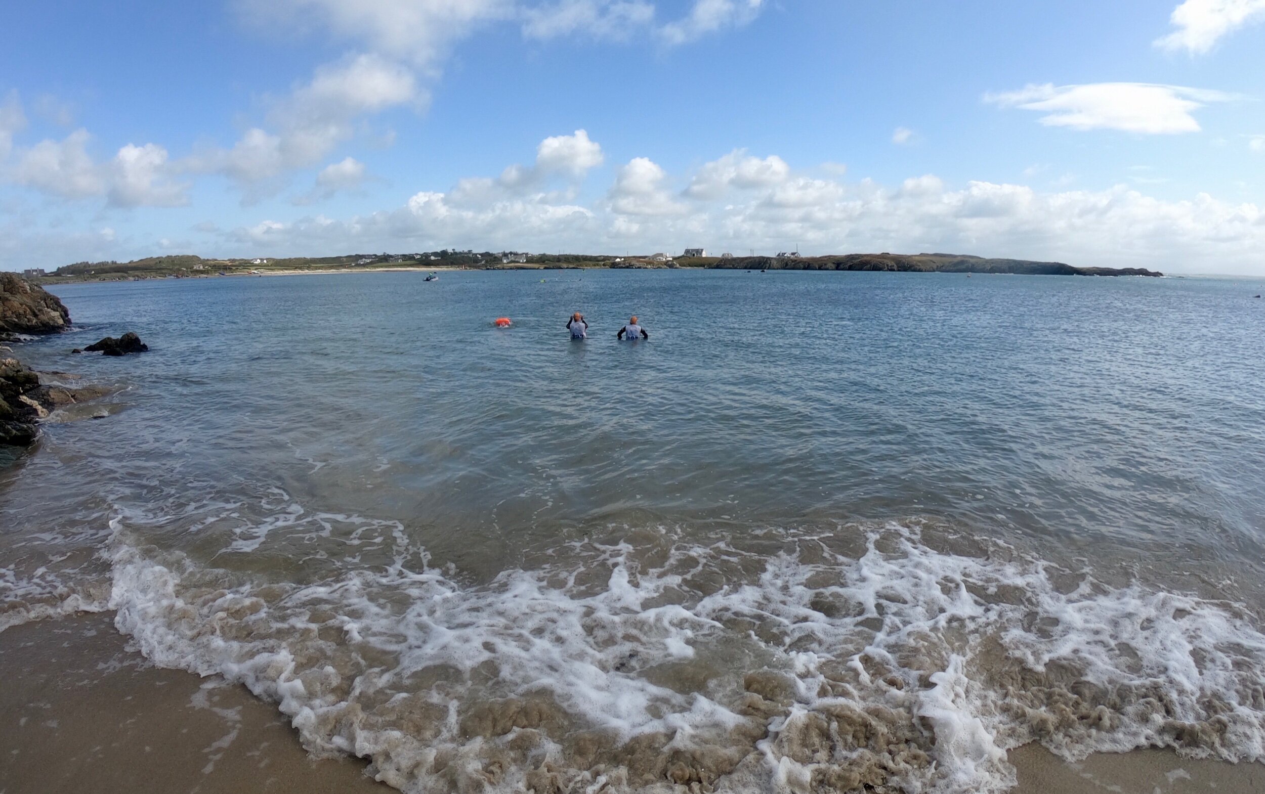 The last swim straight over the bay (but swerve round those rocks in the middle)