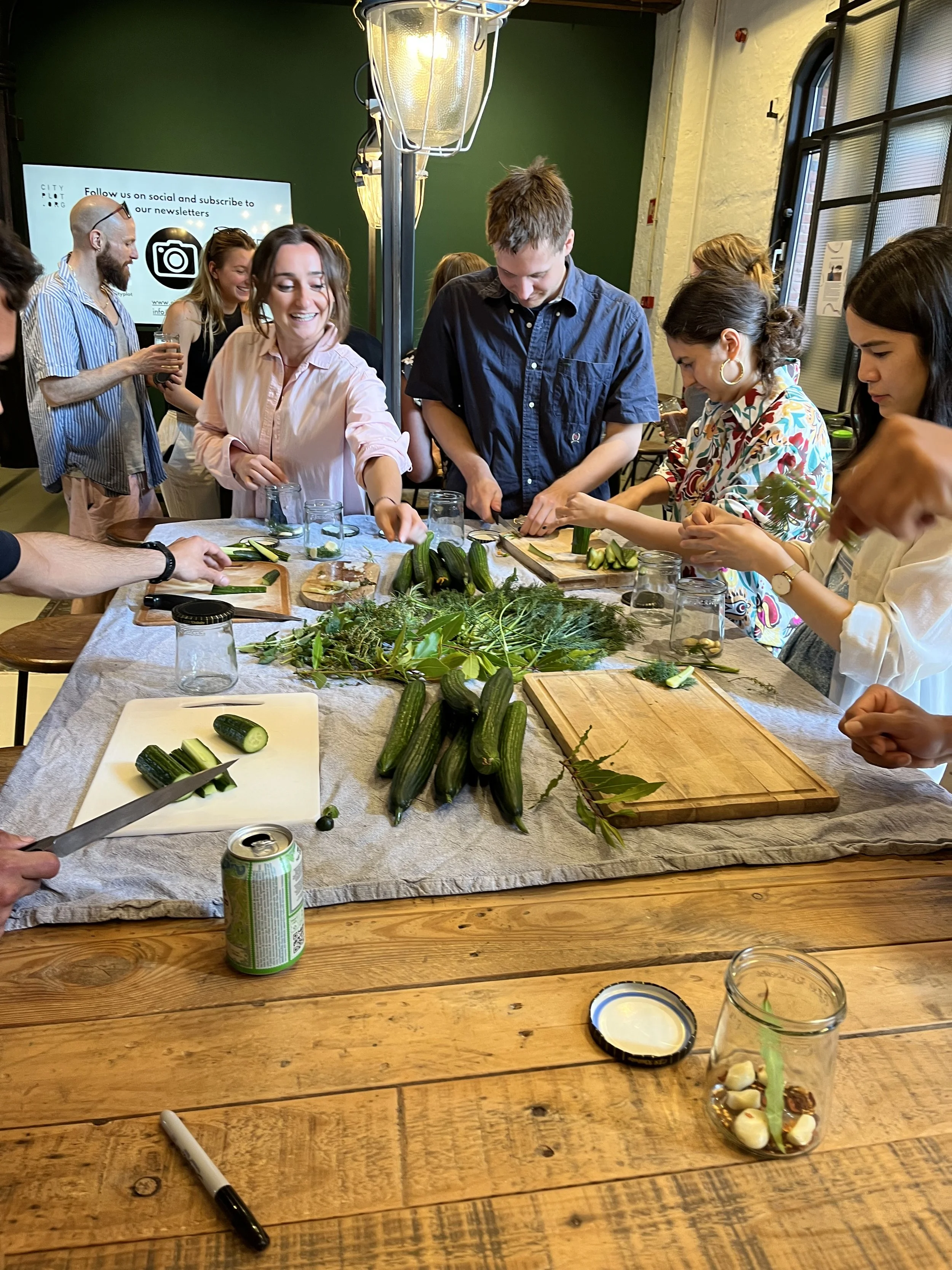 workshop participants preparing ingredients for pickling