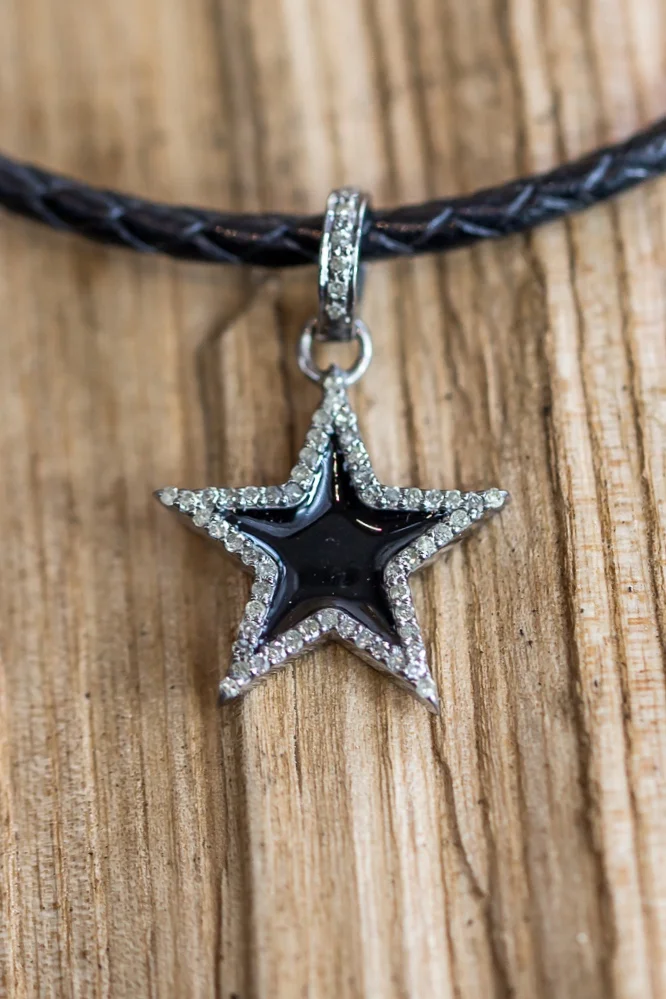 Small black star