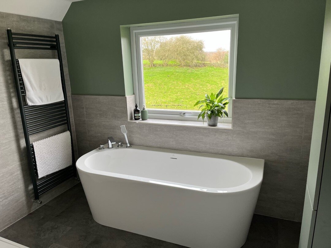 A fabulous bathroom recently completed by our team. 
This room features some beautiful Novo Reed Green furniture from @j.t.ellis, shower cubicle and tray from @matkishowering, a bath, basin and WC from @idealstandardofficial, and a Volcanic radiator 