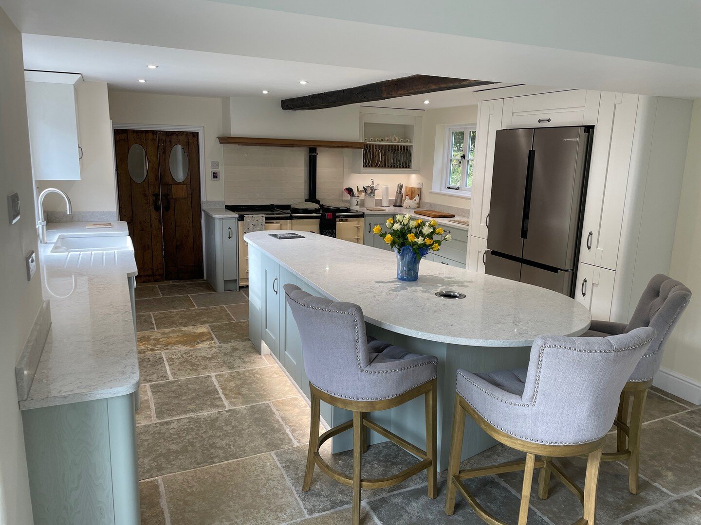 A fabulous @symphonygroup Austin kitchen just completed by our team, with the Duck Egg Blue and Chalk White units complementing each other perfectly. 
Featuring a @quookeruk Flex tap, with boiling, sparkling and chilled water, a @kaelo_uk open bottle