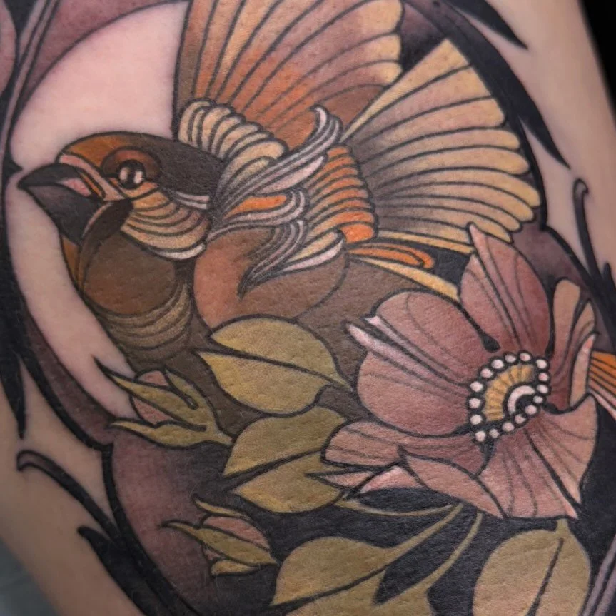 Traditional bird and flower tattoo by Gia Rose