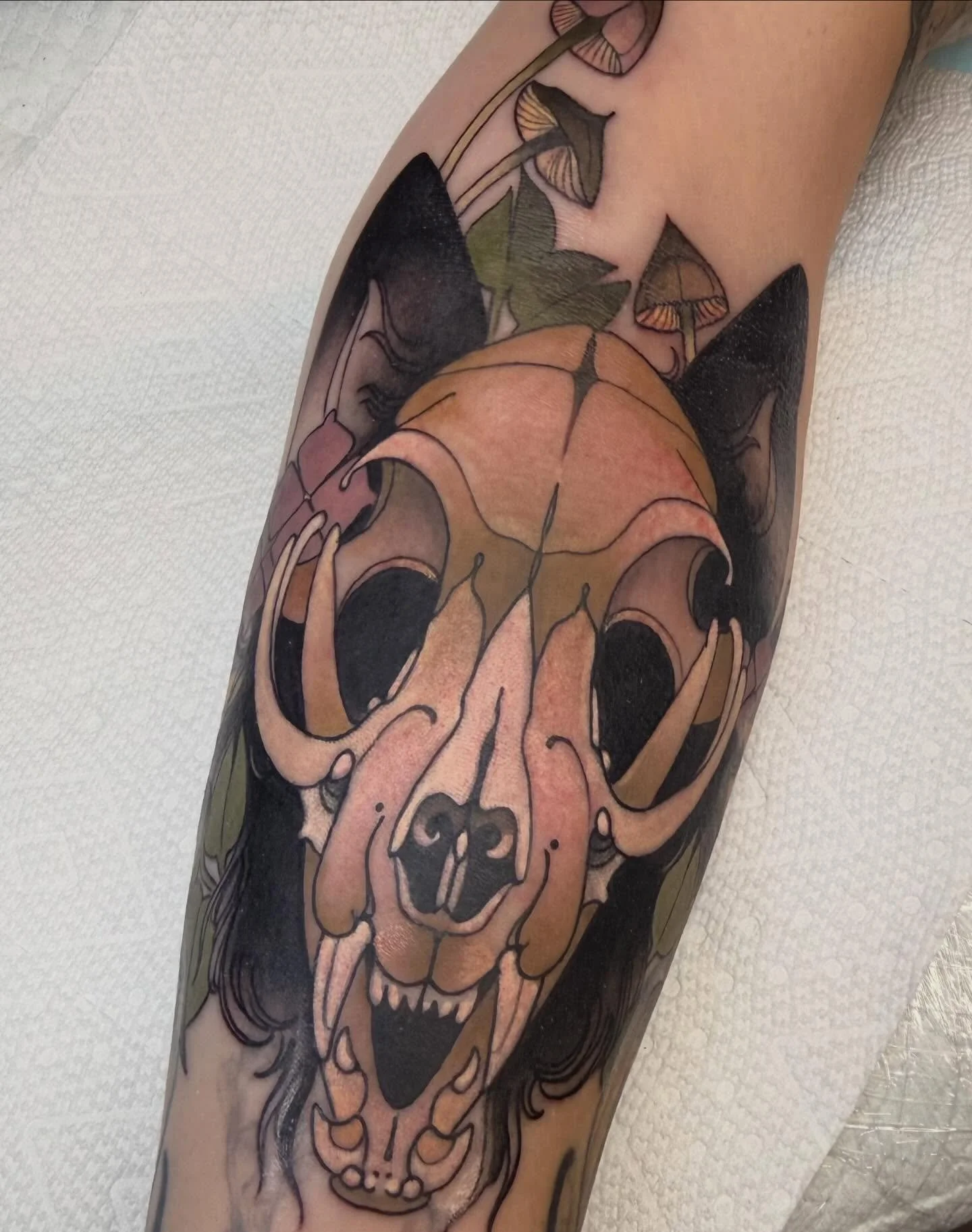 Animal skull tattoo with mushrooms by Gia Rose