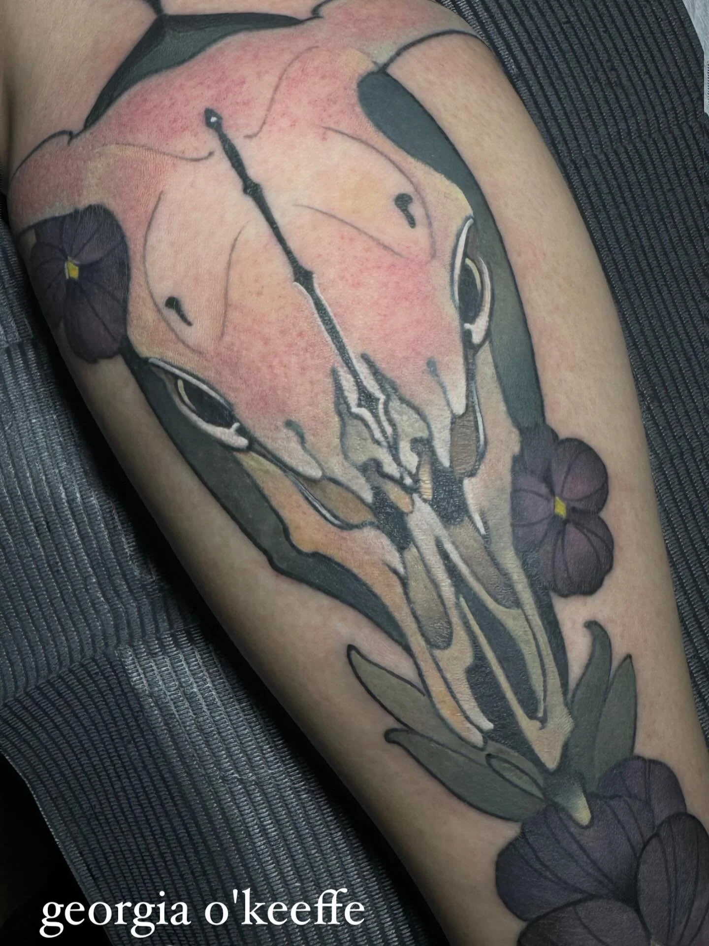 Skull and flower tattoo by Gia Rose