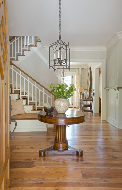 Foyer with reclaimed antique wide plank flooring