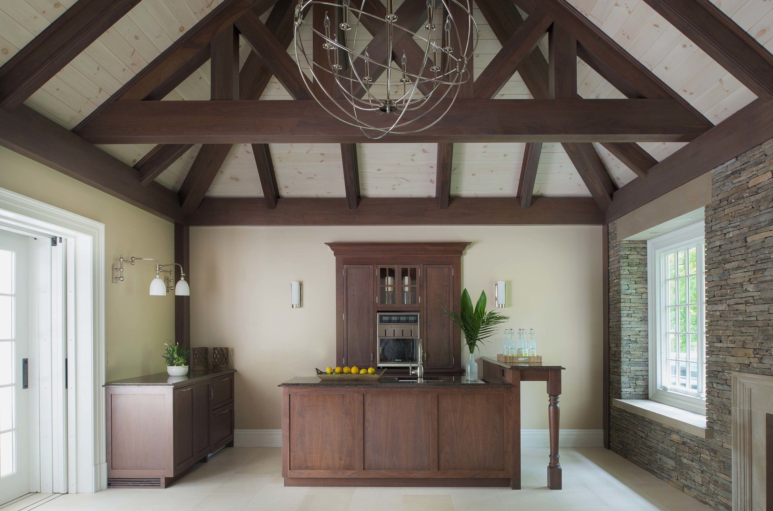 Interior, with custom walnut millwork and beams