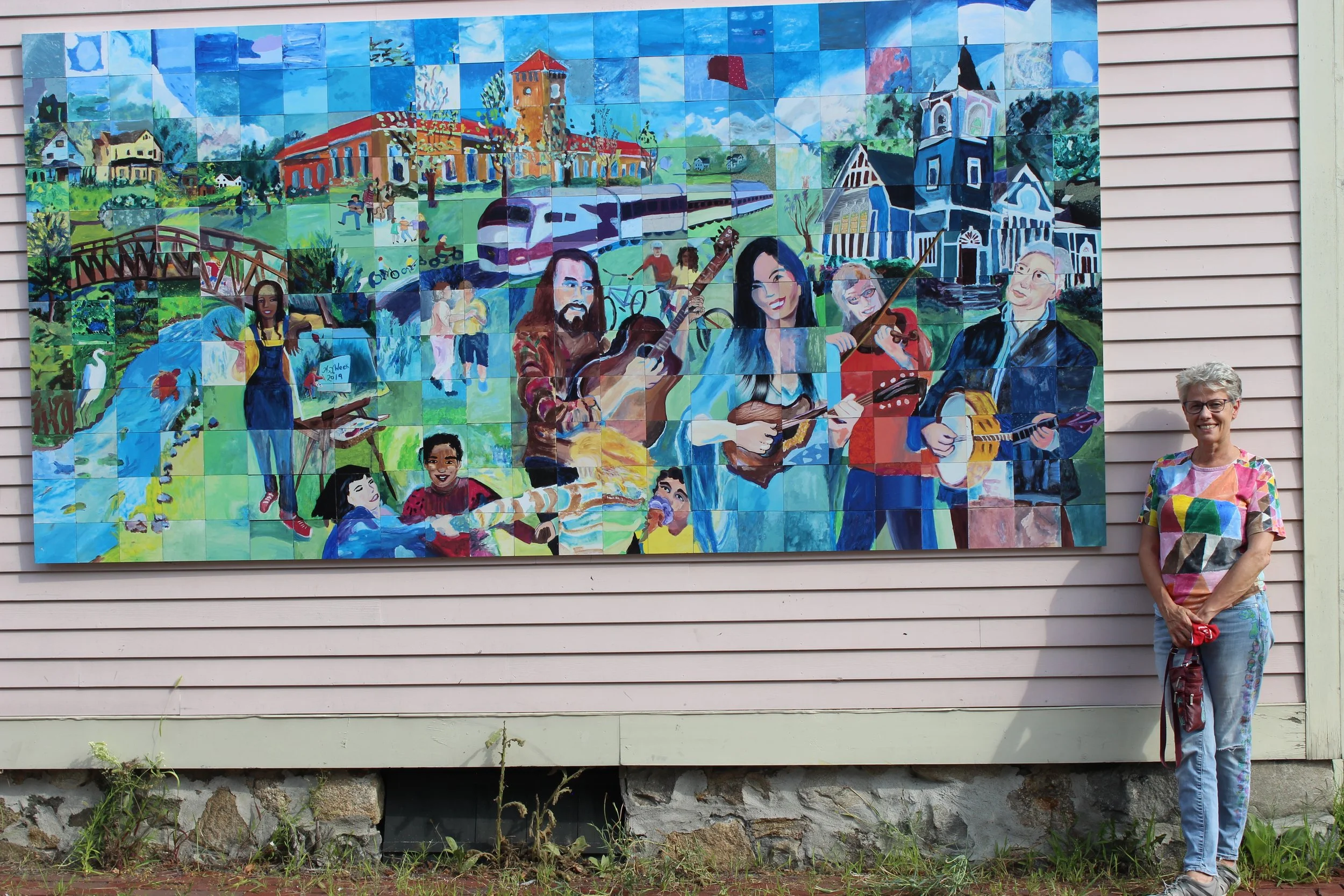 Margot next to mural.JPG