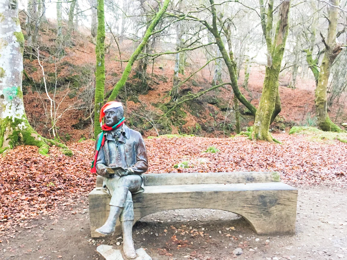 Statue of Robert Burns in the Birks of Aberfeldy. He's in a festive mood...