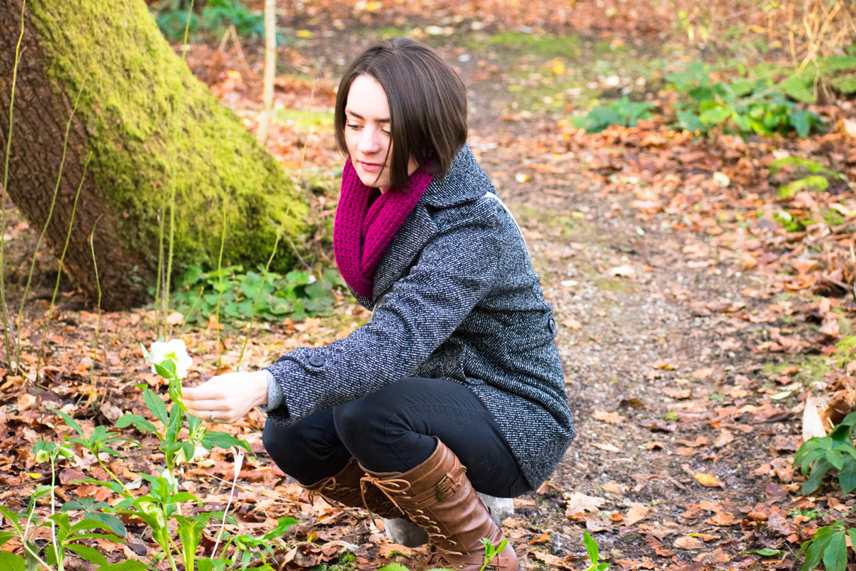 Delisa getting a closer look at one of the last remaining flowers in the Cluny House Gardens