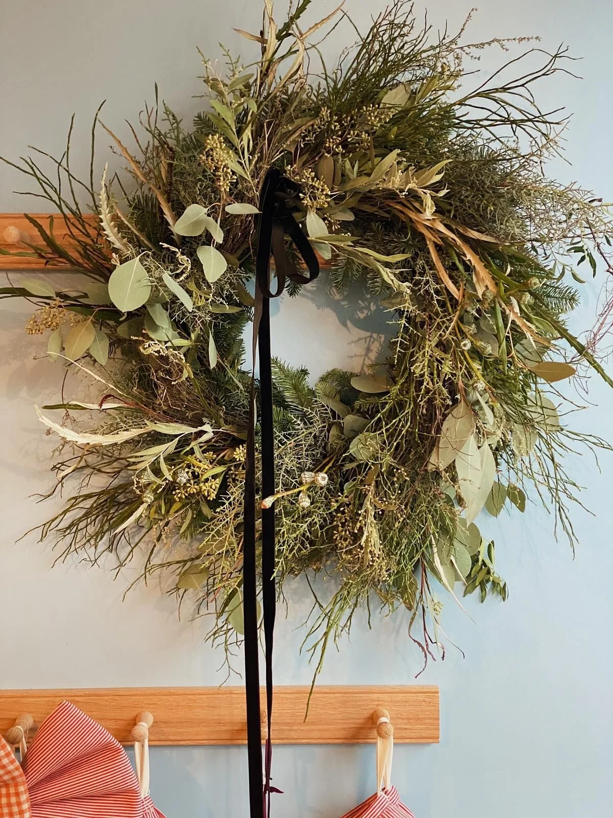 In the thick of the pandemic I couldn’t run my wreath making workshops, so I created a wreath making kit, taking all the elements that makes our workshops such fun so I could send the workshop to you.  I put all the festive touches, a ready mad