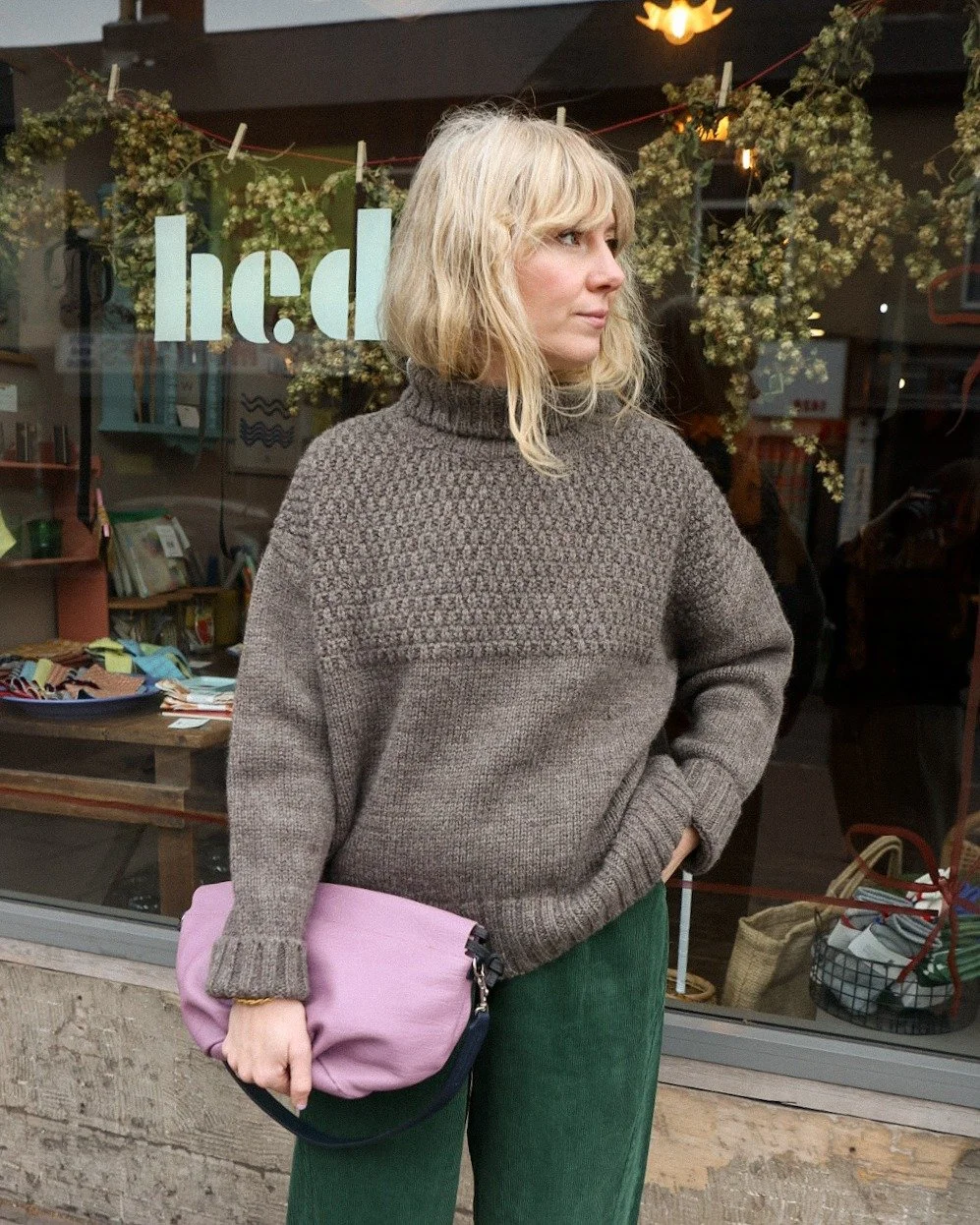 Now the days are shorter and darker this is our uniform as we start to enter hibernation mode. Oversized, woolly  jumpers and comfy, elasticated trousers. Rosie wears the craske funnel neck in this soft rye colour-way and now our favourite arc pants 