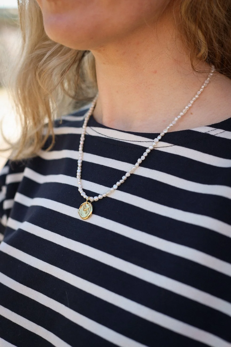 artemis lion ancient coin necklace on string of pearls by taken twice