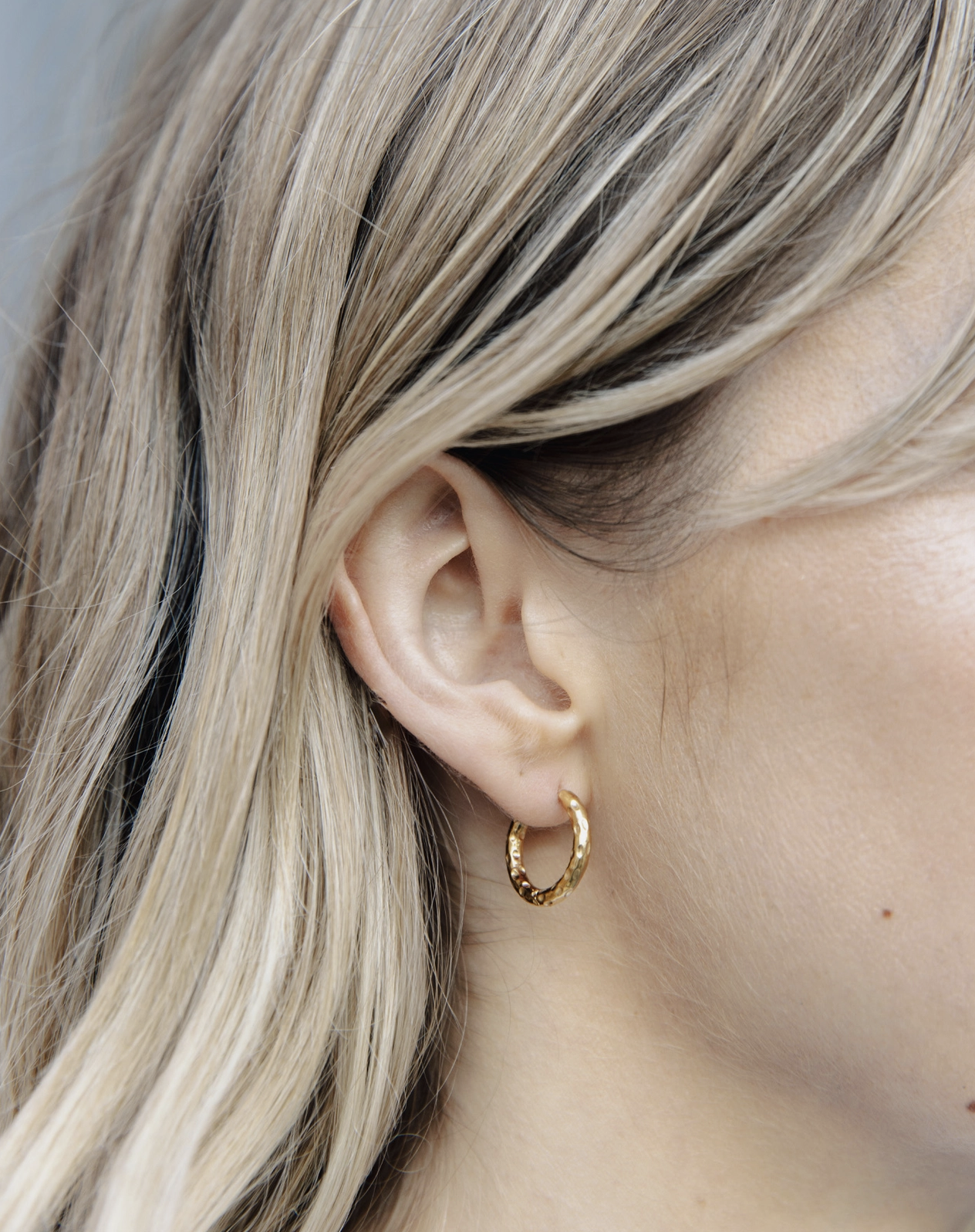 gold hammered hoops by nordic muse