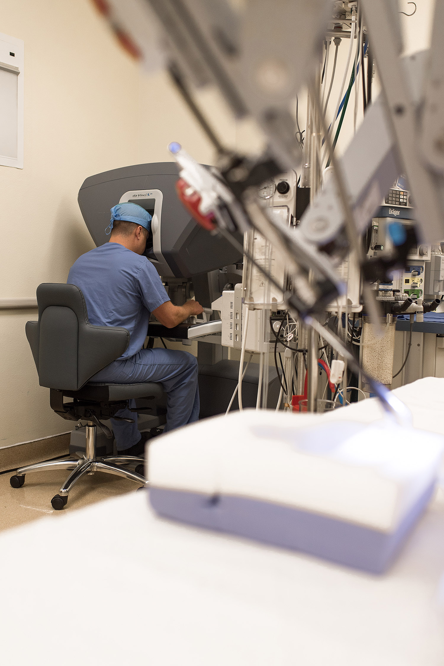 Dr. Patrick Davol at work with the surgical robot.
