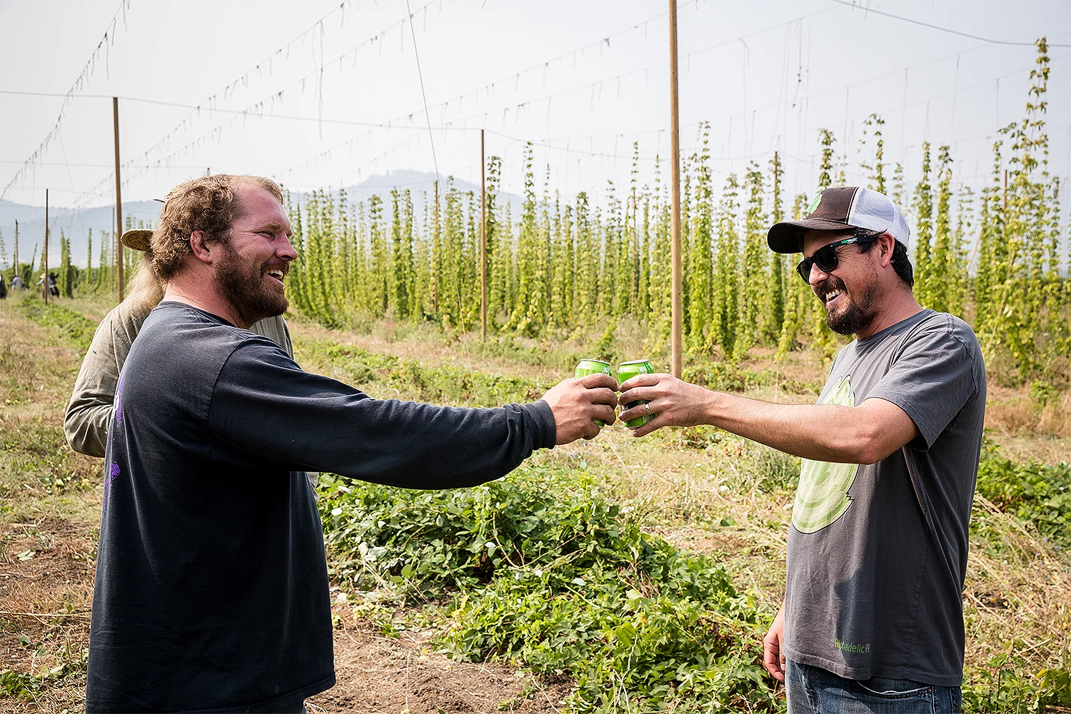 Umpqua Hops owner Cody Parker (left) and Hop Valley brewmasterand co-owner Trevor Howard toast their partnership.