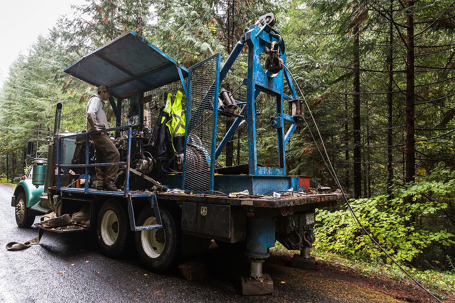Mounted winch and operator.