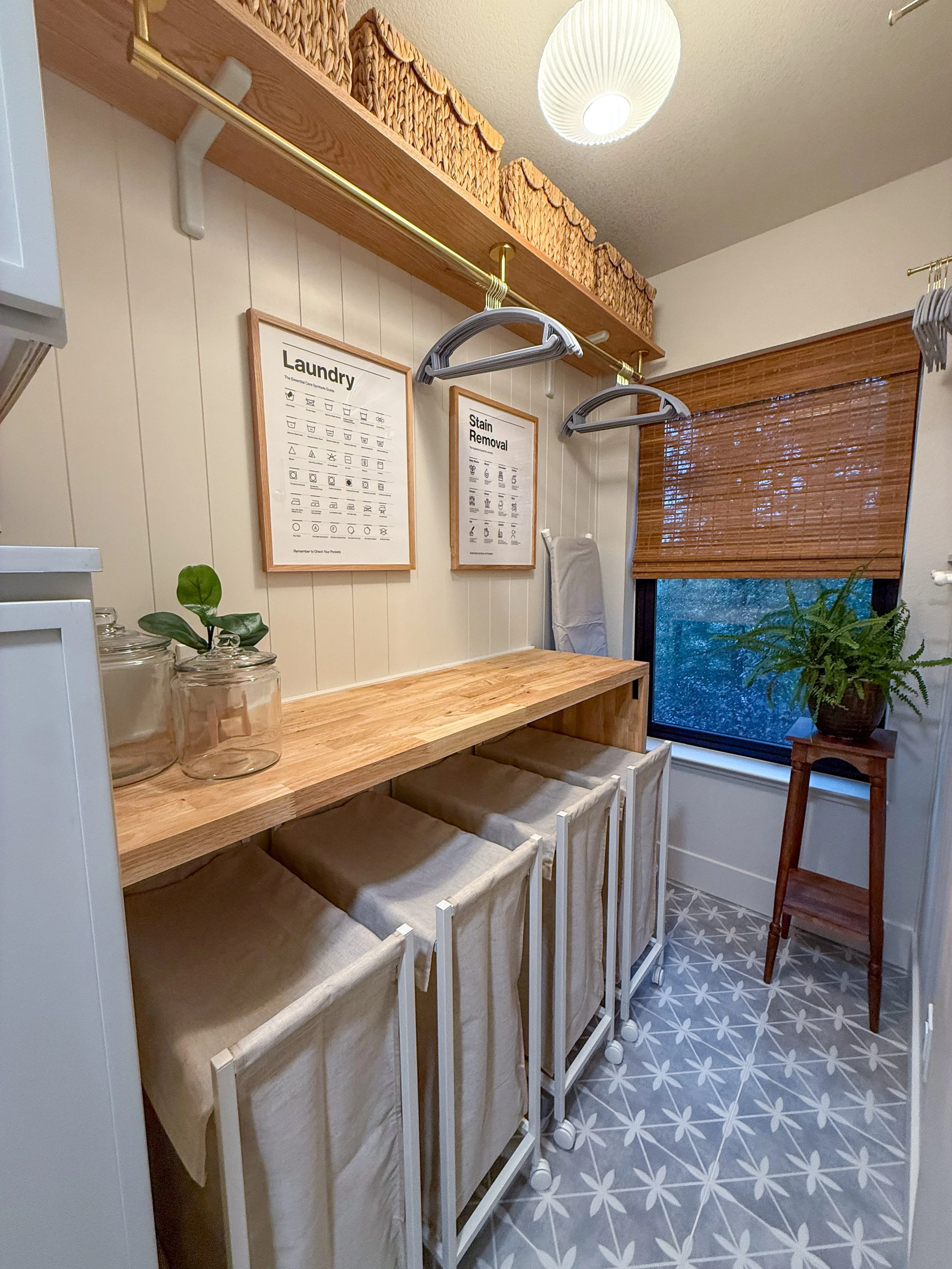 laundry room remodel, french country laundry room, built in storage, folding station, laundry clothes rod, cozy reading nook, open shelving, creative storage solutions, floating shelves decor, shiplap walls, tile flooring, butcher block countertop