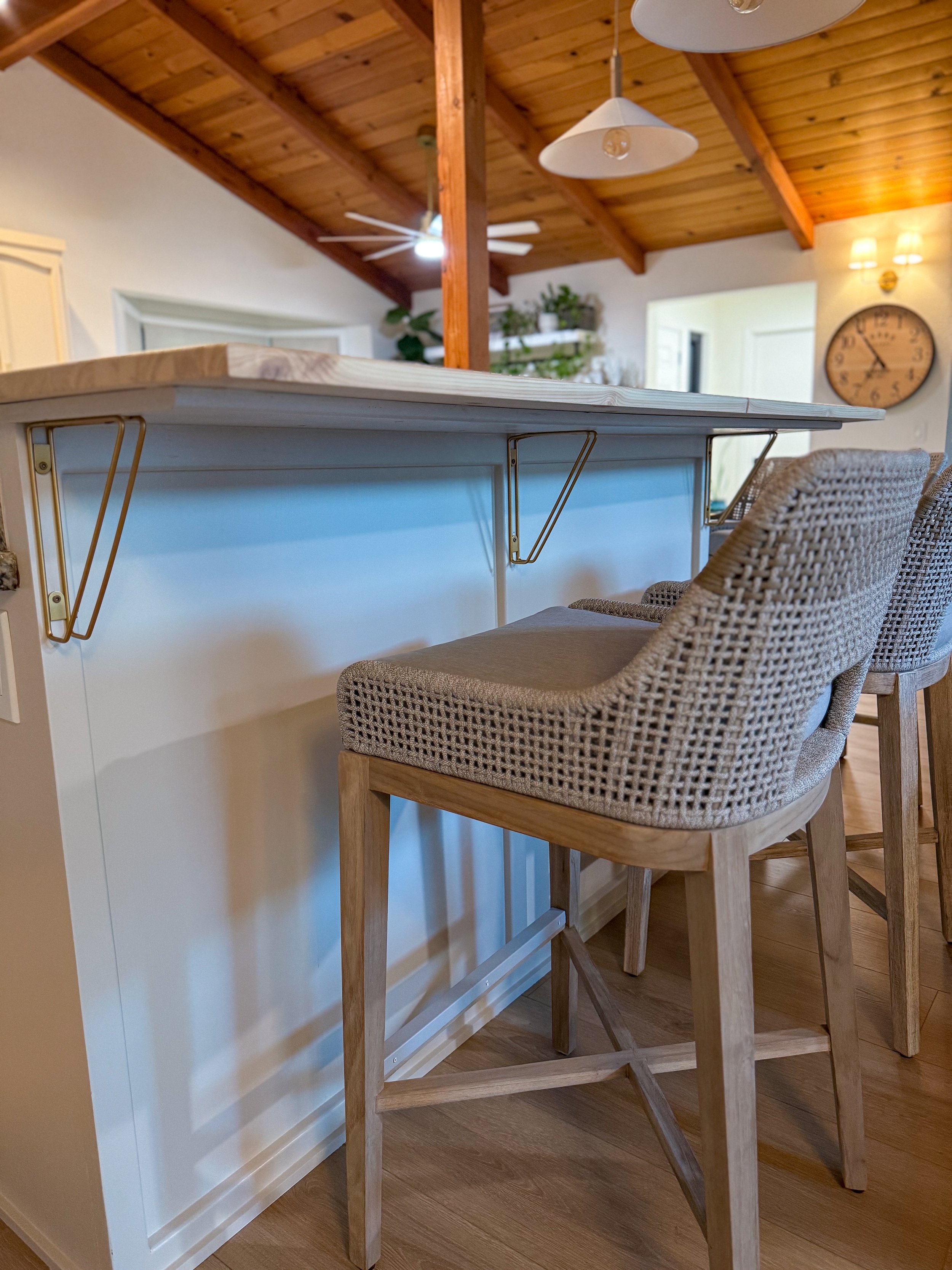 open concept home renovation, kitchen remodel, living room remodel, whole home renovation, light and airy interiors, vaulted wood ceilings, home refresh, custom built-ins, painted kitchen cabinets, interior renovation, pendant lighting